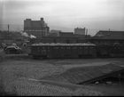 Scrap metal collection at Greensboro, ca. 1940s — C&O gondola 43863 in foreground, Southern boxcar and A&Y car No. 103 behind. UNCG library.