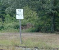 Gulf_ACW_jct_tracks_stopbegin_sign